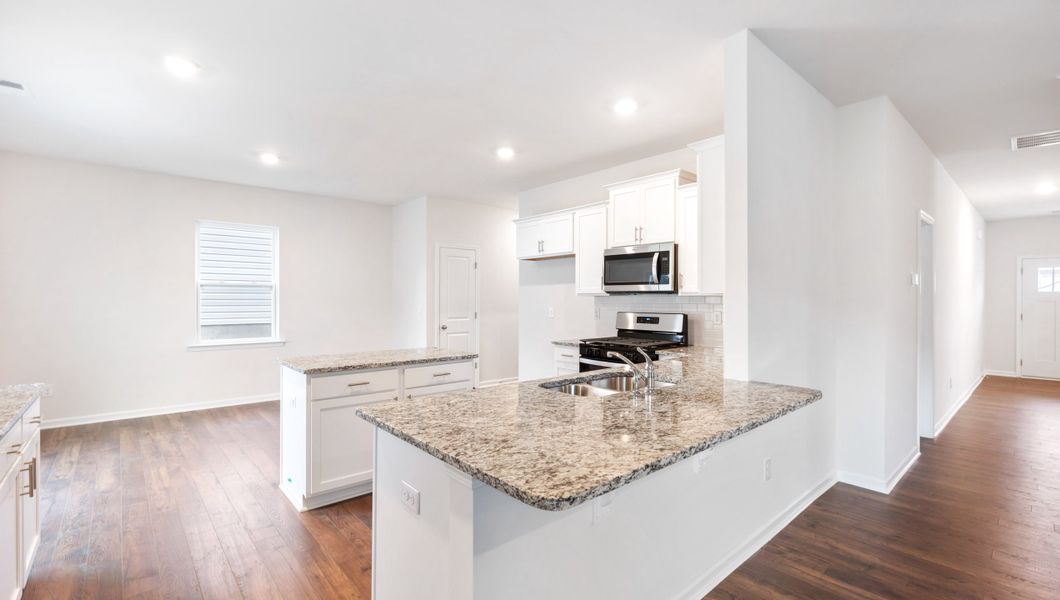 Furnished interior view inside a new home in Hunters Ridge, Woodruff (Image 7).