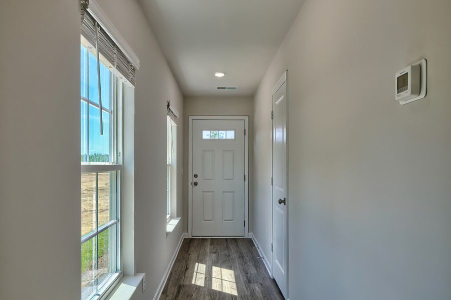 Representative unfurnished interior of a home built from the Juniper by McGuinn Homes in Hunters Branch, Hopkins (Image 8).