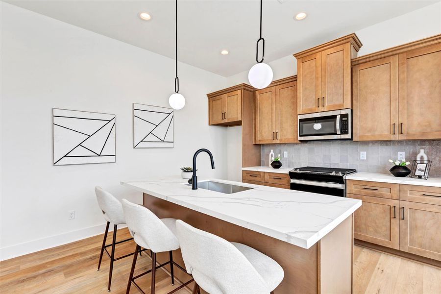 Spacious kitchen cabinets offering ample storage, keeping your kitchen organized and clutter-free. Spacious kitchen cabinets offering ample storage, keeping your kitchen organized and clutter-free.