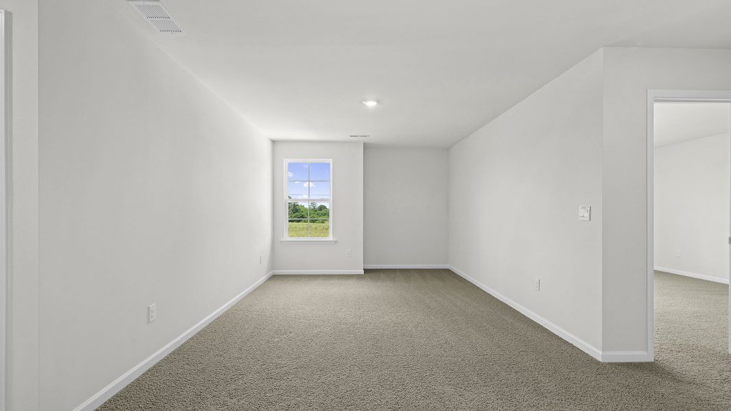 Spacious, unfurnished interior of a new home in The Landing at Summerhaven, Mebane (Image 19).