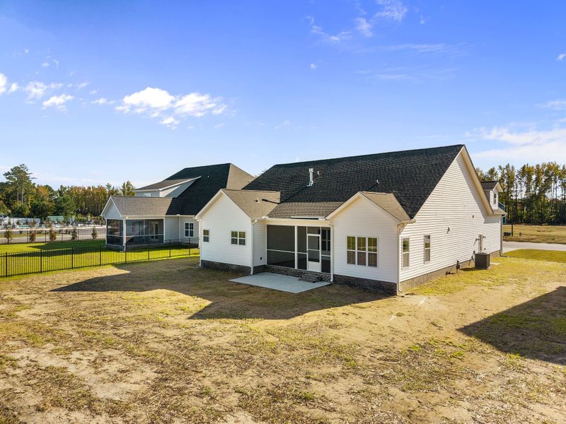 Exterior details and patio area of a home in The Preserve at Langston, Winterville (Image 34).