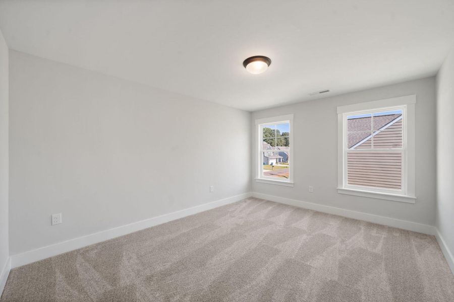Spacious, unfurnished interior of a new home in Fiddler's Ridge, Advance (Image 22).