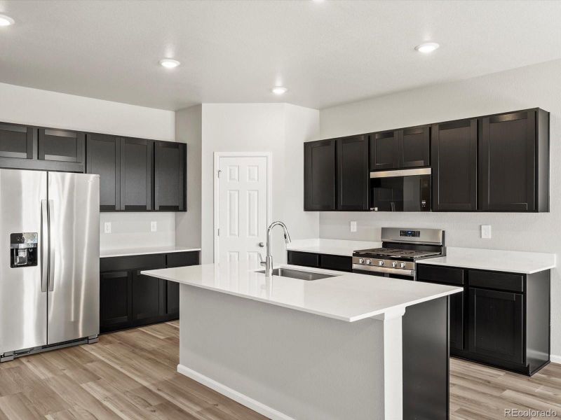 Furnished interior view inside a new home in Buffalo Highlands: The Canyon Collection, Commerce City (Image 11).