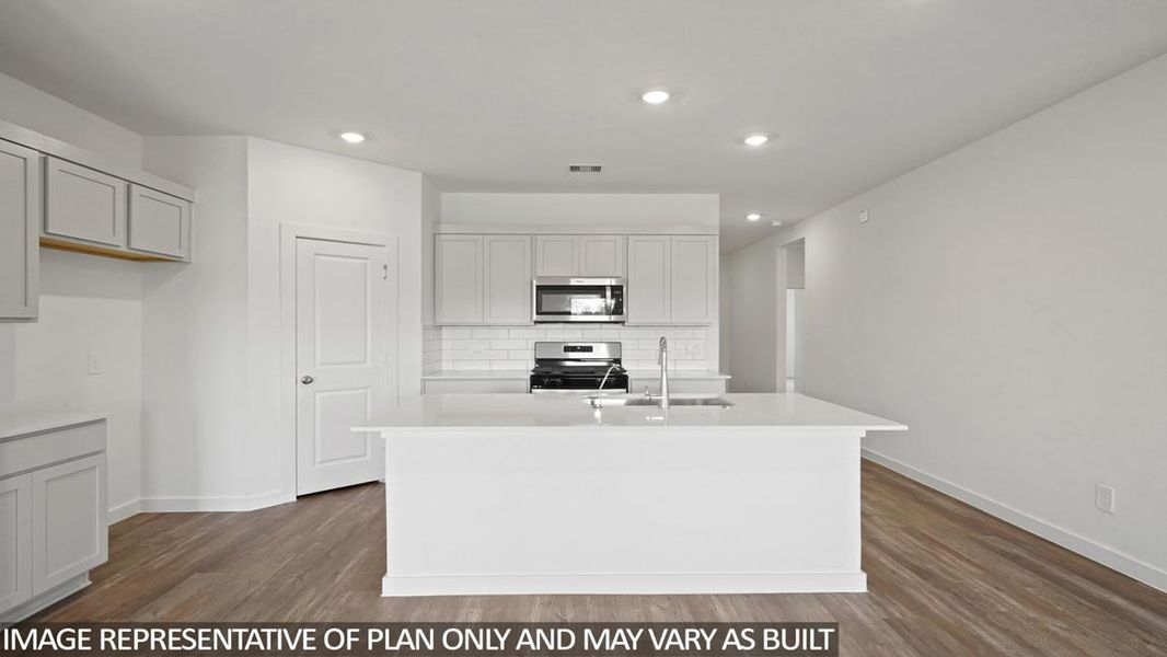 Furnished interior view inside a new home in Sunterra Lakes, Brookshire (Image 5).