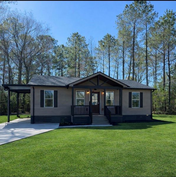 Exterior details and patio area of a home in , Plantersville (Image 20). Exterior details and patio area of a home in , Plantersville (Image 20).
