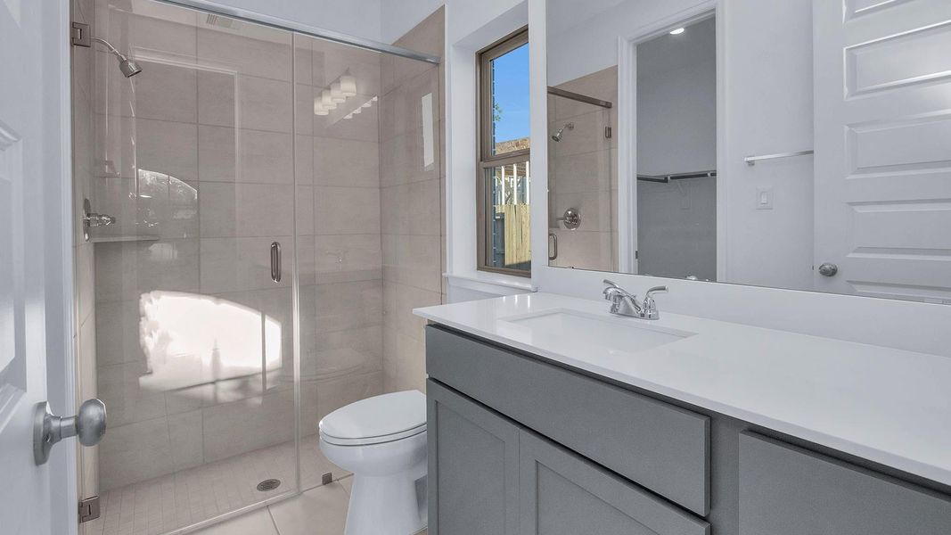 Furnished interior view inside a new home in Grand Central Park, Conroe (Image 8).