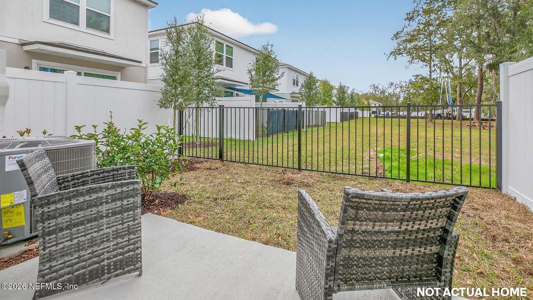 Exterior details and patio area of a home in Irongate Villas, Jacksonville (Image 3).