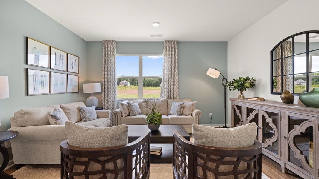 Representative furnished interior of a home built from the Cali by D.R. Horton in Champion's Run, Lithonia (Image 8).