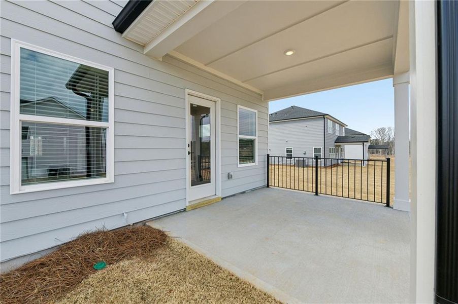 Exterior details and patio area of a home in River Pointe, Monroe (Image 4).