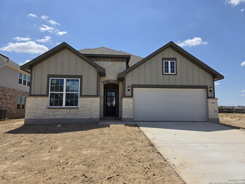 Front exterior of a new home in The Heights at Saddlebrook Ranch 60's, Schertz, TX, highlighting curb appeal (Image 2).