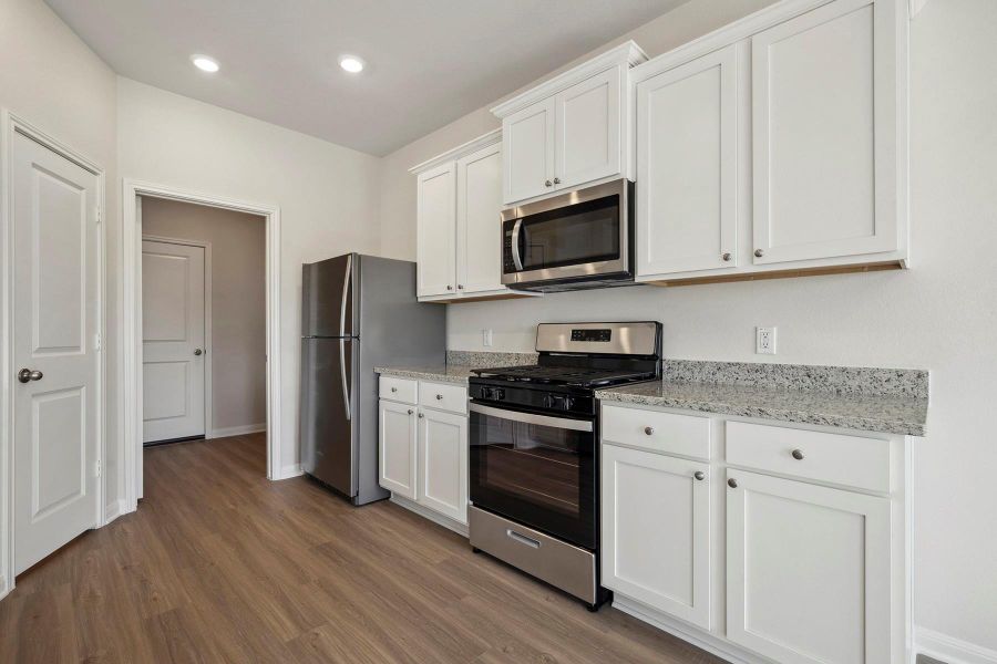 Furnished interior view inside a new home in Trails at Cochran Ranch, Waller (Image 11).