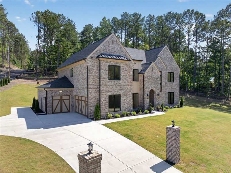 Front exterior of a new home in , Dacula, GA, highlighting curb appeal (Image 2). Front exterior of a new home in , Dacula, GA, highlighting curb appeal (Image 2).