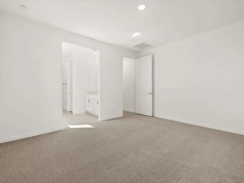 Spacious, unfurnished interior of a new home in Entrada Reserve Series, Tolleson (Image 11).