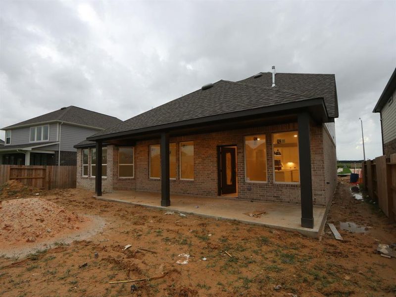Front exterior of a new home in Marvida, Cypress, TX, highlighting curb appeal (Image 13).