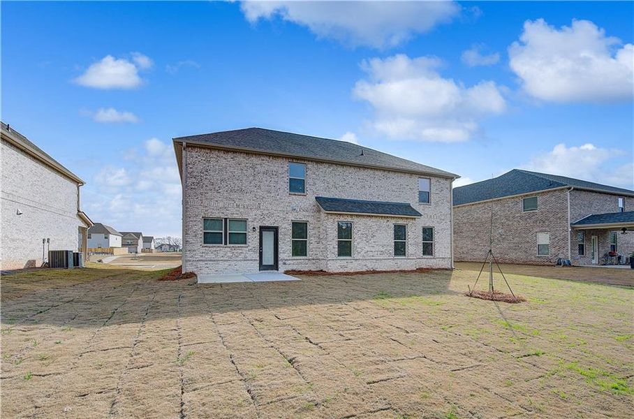 Exterior details and patio area of a home in Adagio, Dacula (Image 4). Exterior details and patio area of a home in Adagio, Dacula (Image 4).