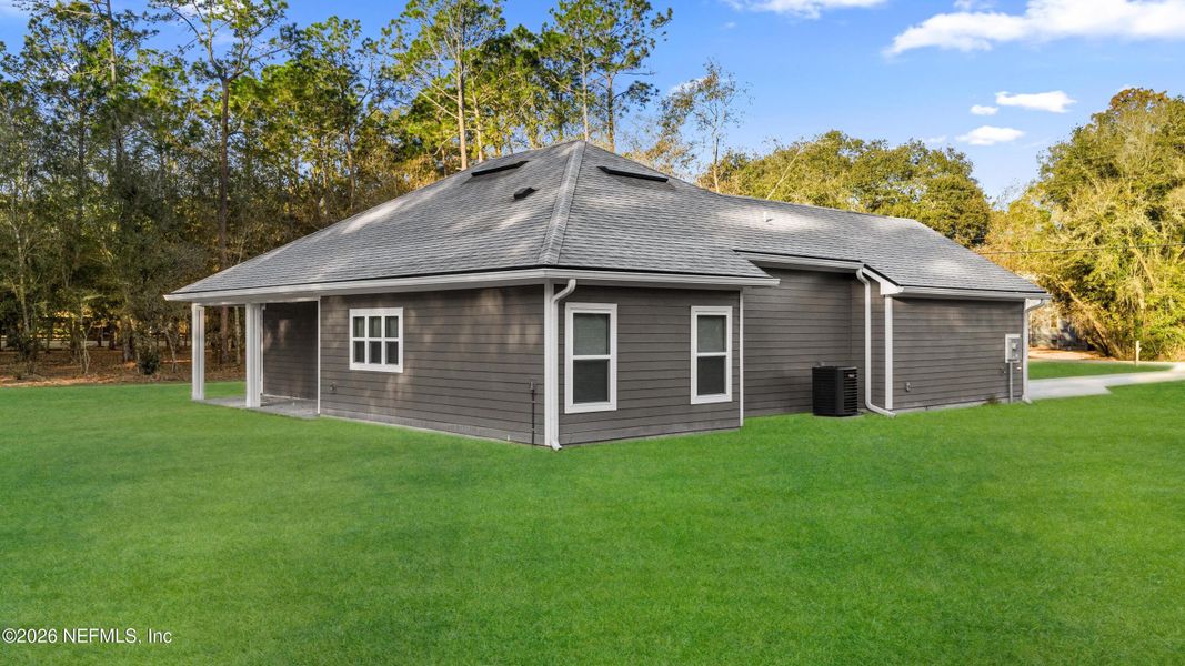 Exterior details and patio area of a home in , Keystone Heights (Image 25). Exterior details and patio area of a home in , Keystone Heights (Image 25).