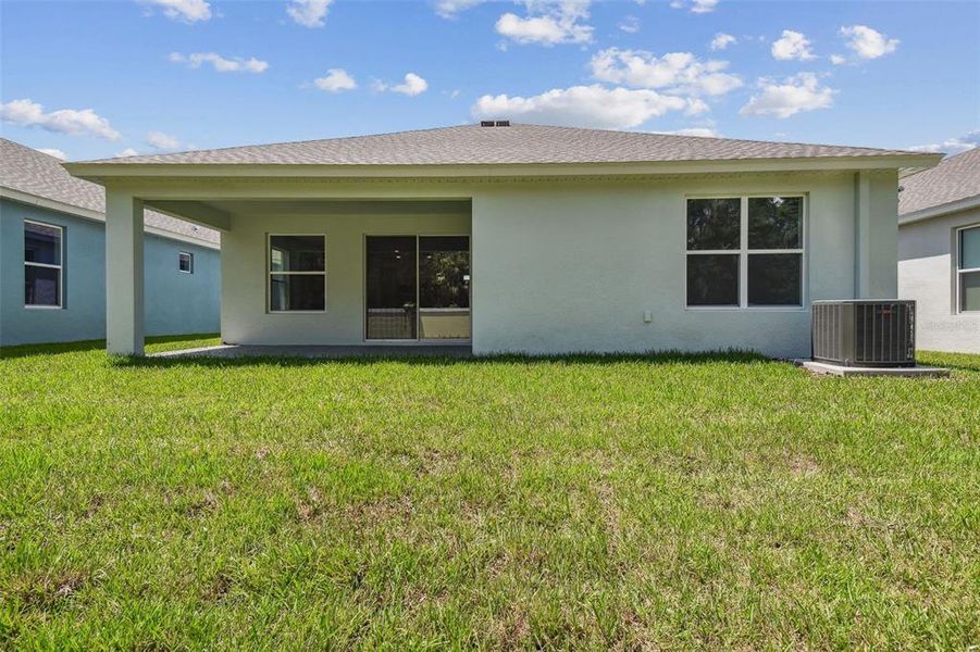 Front exterior of a new home in Cascades at Southern Hills, Brooksville, FL, highlighting curb appeal (Image 25).