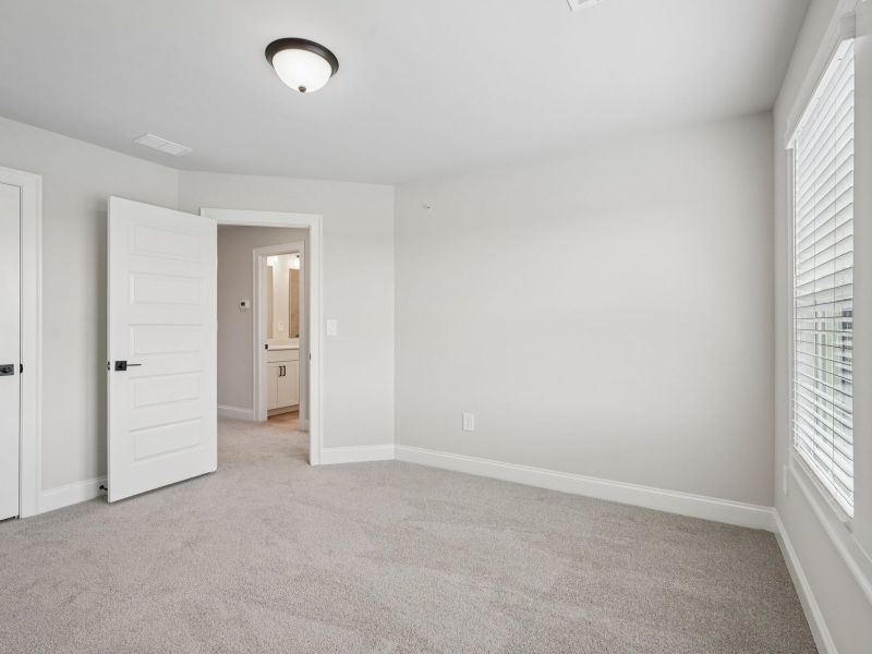 Spacious, unfurnished interior of a new home in Hemingway - Highland Series, Cumming (Image 18).