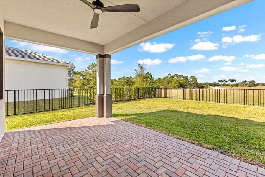 Exterior details and patio area of a home in Tesoro Club, Port St. Lucie (Image 2).
