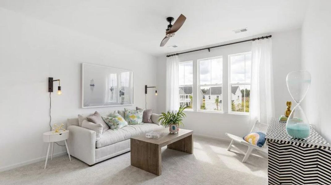 Furnished interior view inside a new home in Carnes Crossroads: Row Collection, Summerville (Image 3). Furnished interior view inside a new home in Carnes Crossroads: Row Collection, Summerville (Image 3).