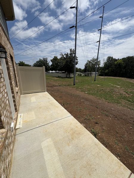 Front exterior of a new home in Talia Trace, Smyrna, TN, highlighting curb appeal (Image 13). Front exterior of a new home in Talia Trace, Smyrna, TN, highlighting curb appeal (Image 13).