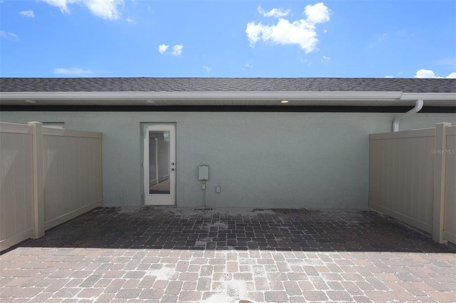 Exterior details and patio area of a home in Center Lake on the Park, St. Cloud (Image 9).