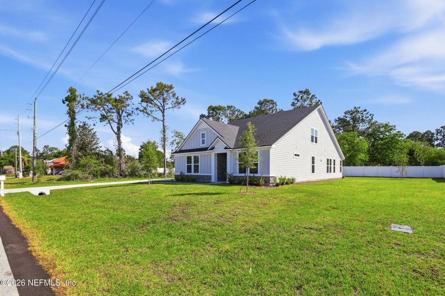 Exterior details and patio area of a home in Palm Coast Homes, Palm Coast (Image 33).