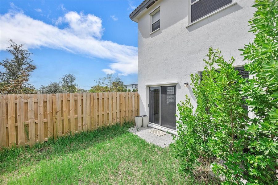 Front exterior of a new home in , Homestead, FL, highlighting curb appeal (Image 23).
