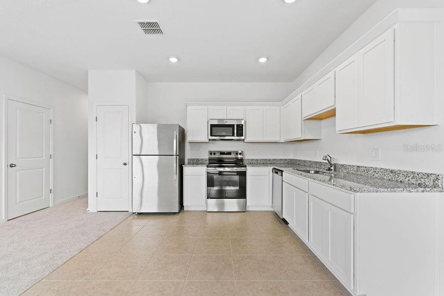 Furnished interior view inside a new home in , Davenport (Image 4).