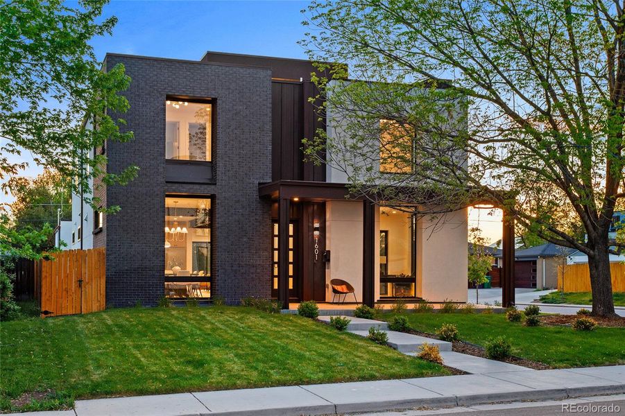 Front exterior of a new home in , Denver, CO, highlighting curb appeal (Image 24).