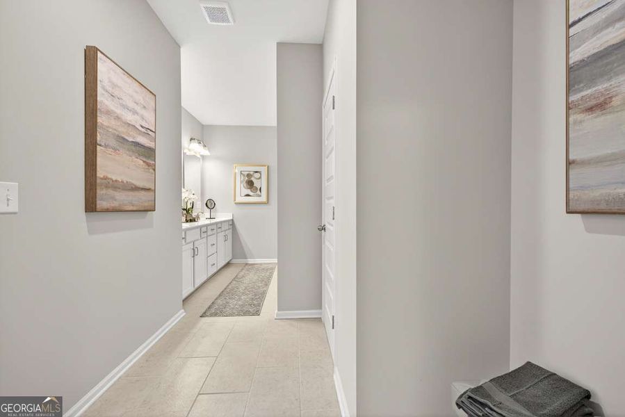 Furnished interior view inside a new home in Crescent Towns, Riverdale (Image 28).