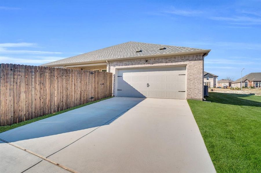 Exterior details and patio area of a home in Ten Mile Creek Estates, DeSoto (Image 20). Exterior details and patio area of a home in Ten Mile Creek Estates, DeSoto (Image 20).