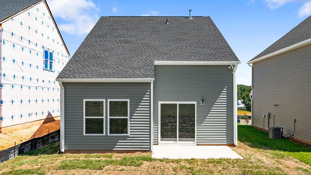 Front exterior of a new home in Hanes Lake, Winston-Salem, NC, highlighting curb appeal (Image 25). Front exterior of a new home in Hanes Lake, Winston-Salem, NC, highlighting curb appeal (Image 25).