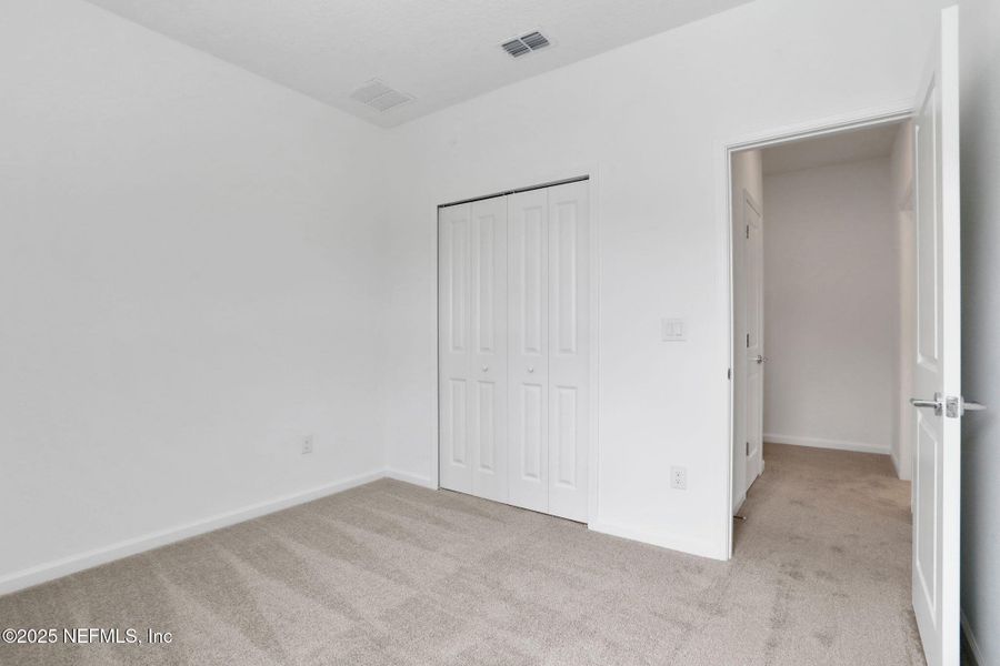 Spacious, unfurnished interior of a new home in TrailMark, St. Augustine (Image 33). Spacious, unfurnished interior of a new home in TrailMark, St. Augustine (Image 33).
