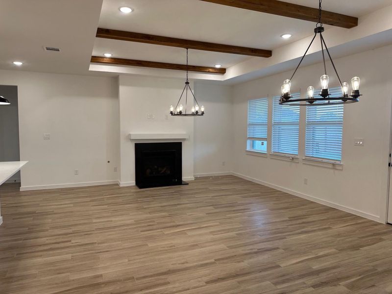 Gorgeous dining area and great room with fireplace Gorgeous dining area and great room with fireplace