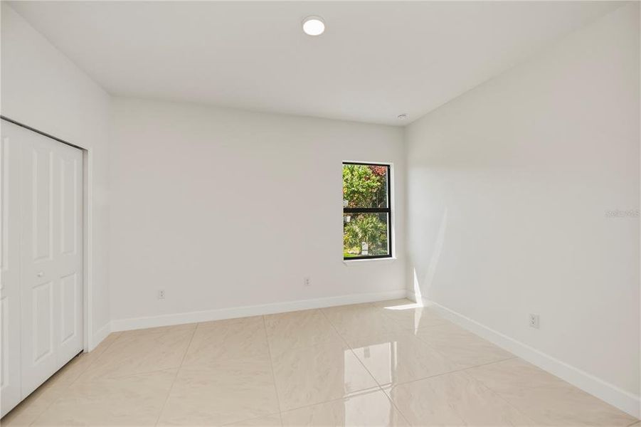 Spacious, unfurnished interior of a new home in , Port Charlotte (Image 48).