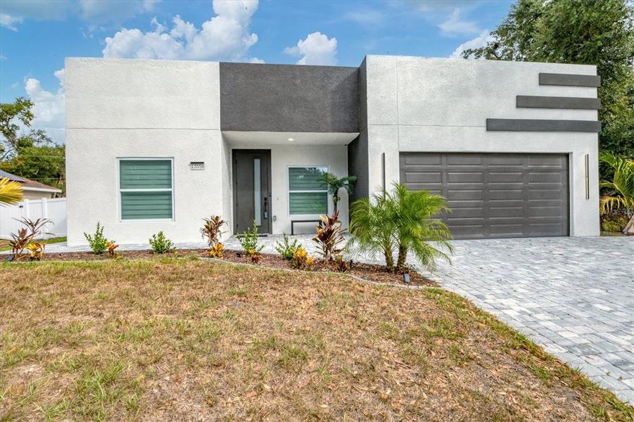 Front exterior of a new home in , Port Charlotte, FL, highlighting curb appeal (Image 19).