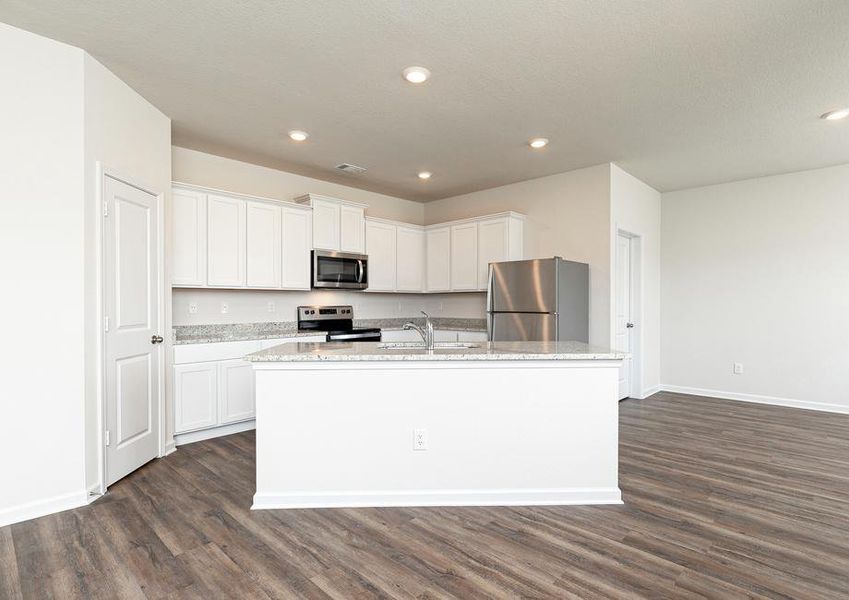 This lovely kitchen comes with stainless steel appliances