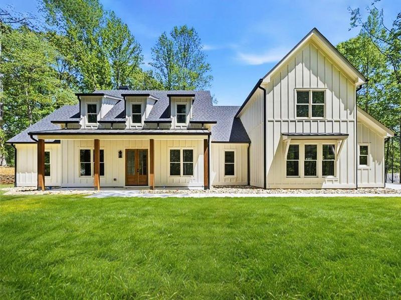 Front exterior of a new home in , Canton, GA, highlighting curb appeal (Image 30).