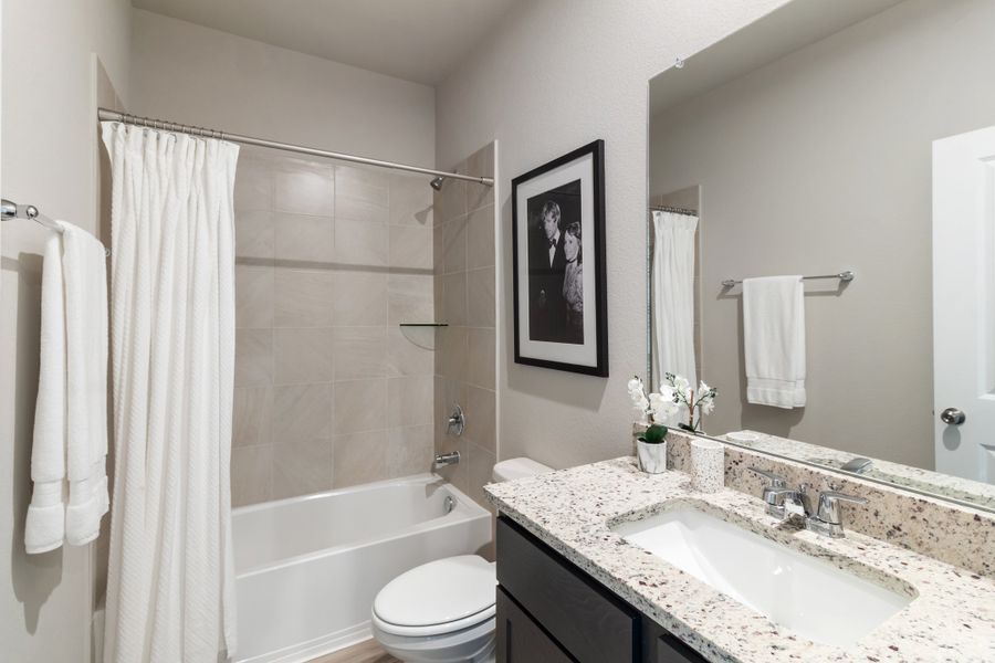 Representative furnished interior of a home built from the Frio by Omega Builders in Hillside Village, Temple (Image 12).