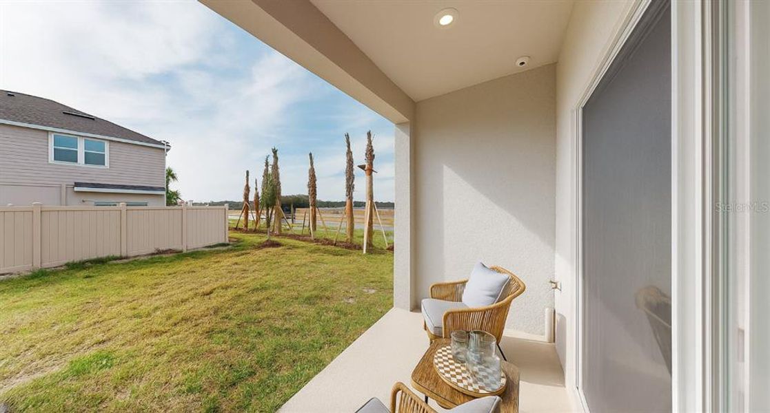 Exterior details and patio area of a home in The Townhomes at Westview, Kissimmee (Image 3).