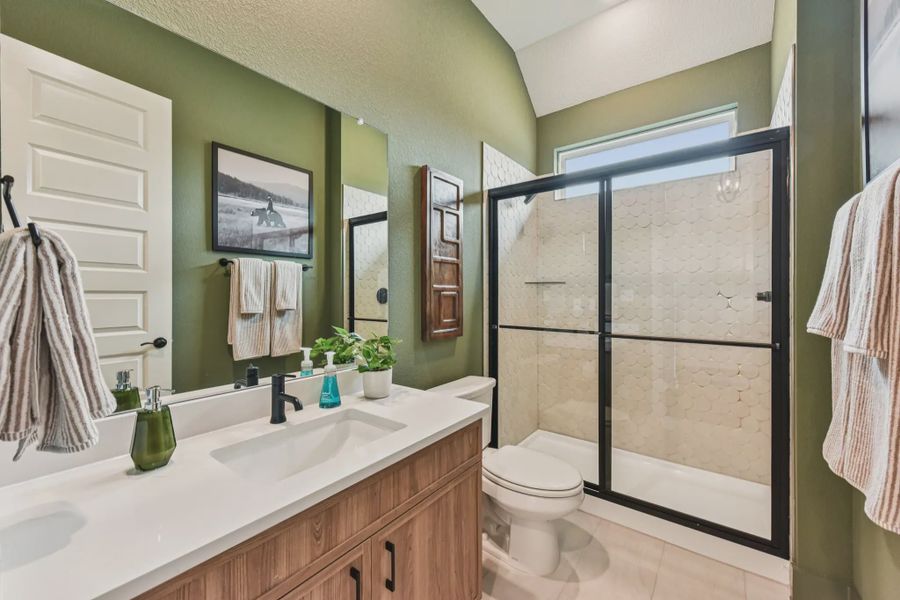 Representative furnished interior of a home built from the Sicily by Chesmar Homes in Lakes of Cane Island, Katy (Image 16).