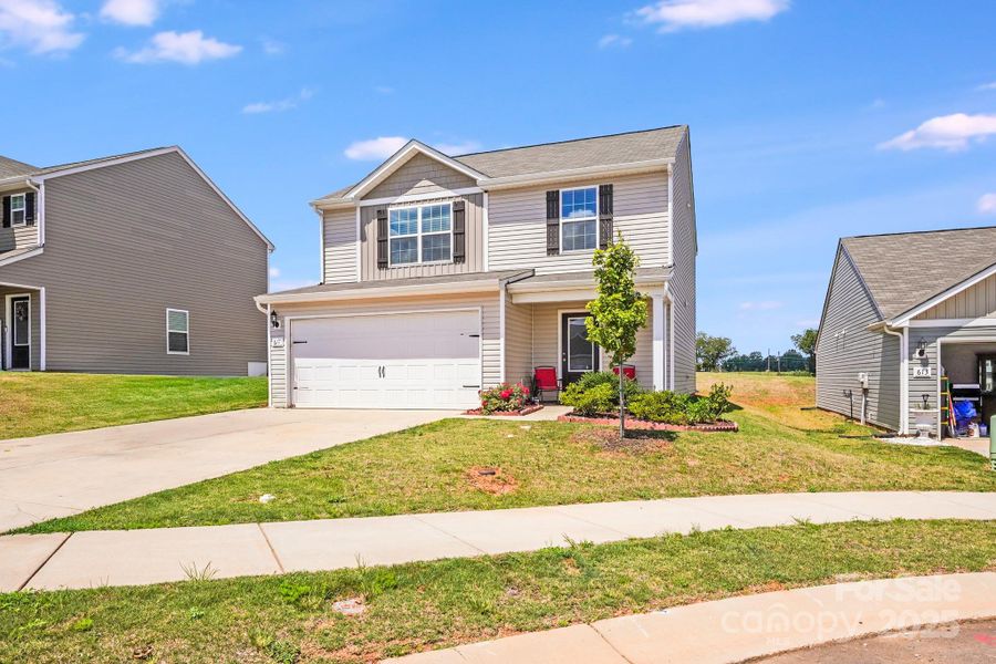 Front exterior of a new home in Pinnacle Estates, Shelby, NC, highlighting curb appeal (Image 1).
