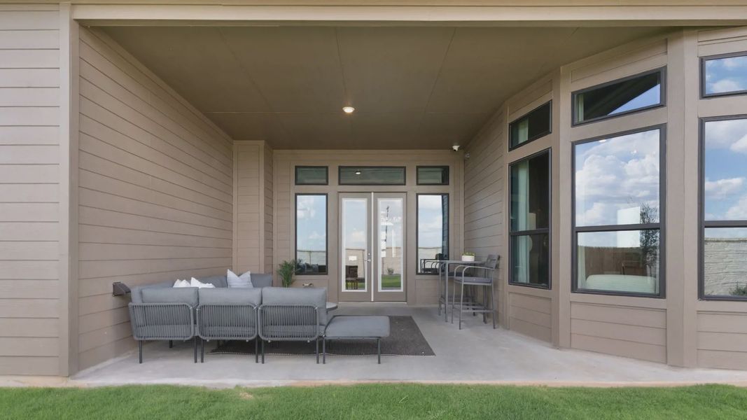 Exterior details and patio area of a home in Newhaven, Manor (Image 3).