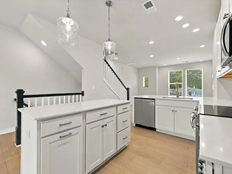 Furnished interior view inside a new home in Central Living at Craig, Charlotte (Image 6).