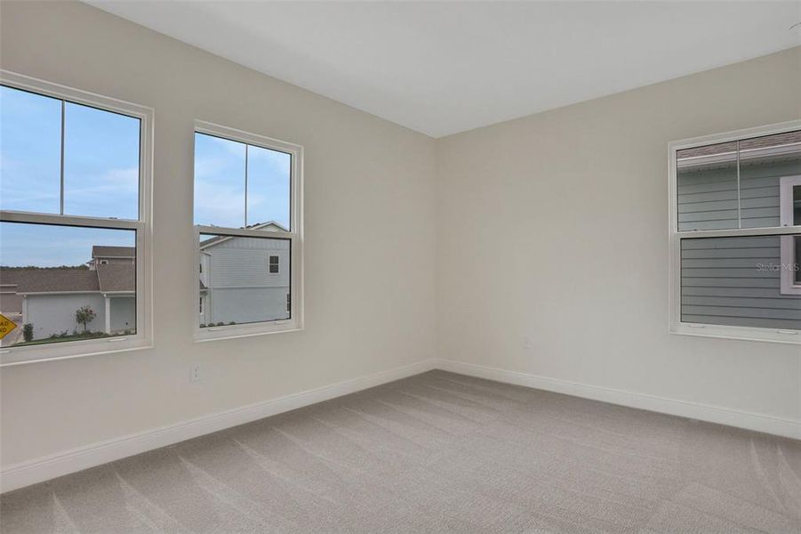 Spacious, unfurnished interior of a new home in Bungalow Walk at Lakewood Ranch, Sarasota (Image 12).