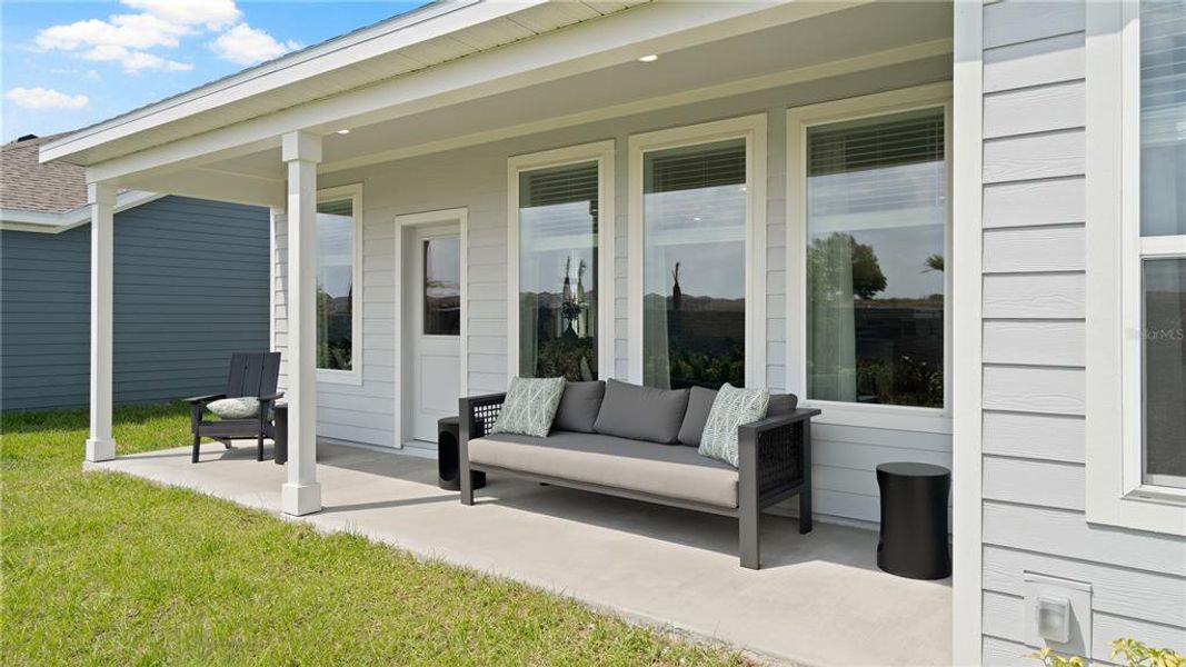 Exterior details and patio area of a home in Wellness Ridge, Clermont (Image 2).