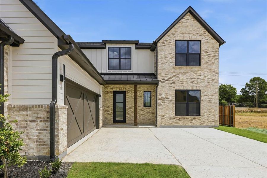Front exterior of a new home in The Grove, North Richland Hills, TX, highlighting curb appeal (Image 26).