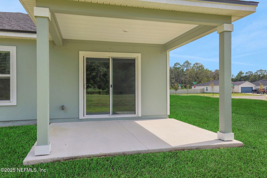 Front exterior of a new home in Wilford Oaks, Orange Park, FL, highlighting curb appeal (Image 19). Front exterior of a new home in Wilford Oaks, Orange Park, FL, highlighting curb appeal (Image 19).