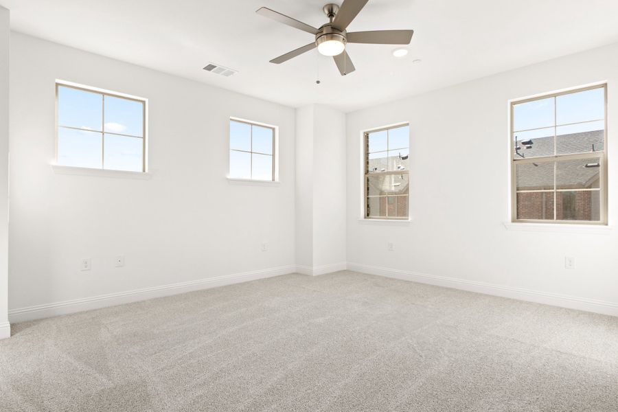 Spacious, unfurnished interior of a new home in The Tribute, The Colony (Image 24).